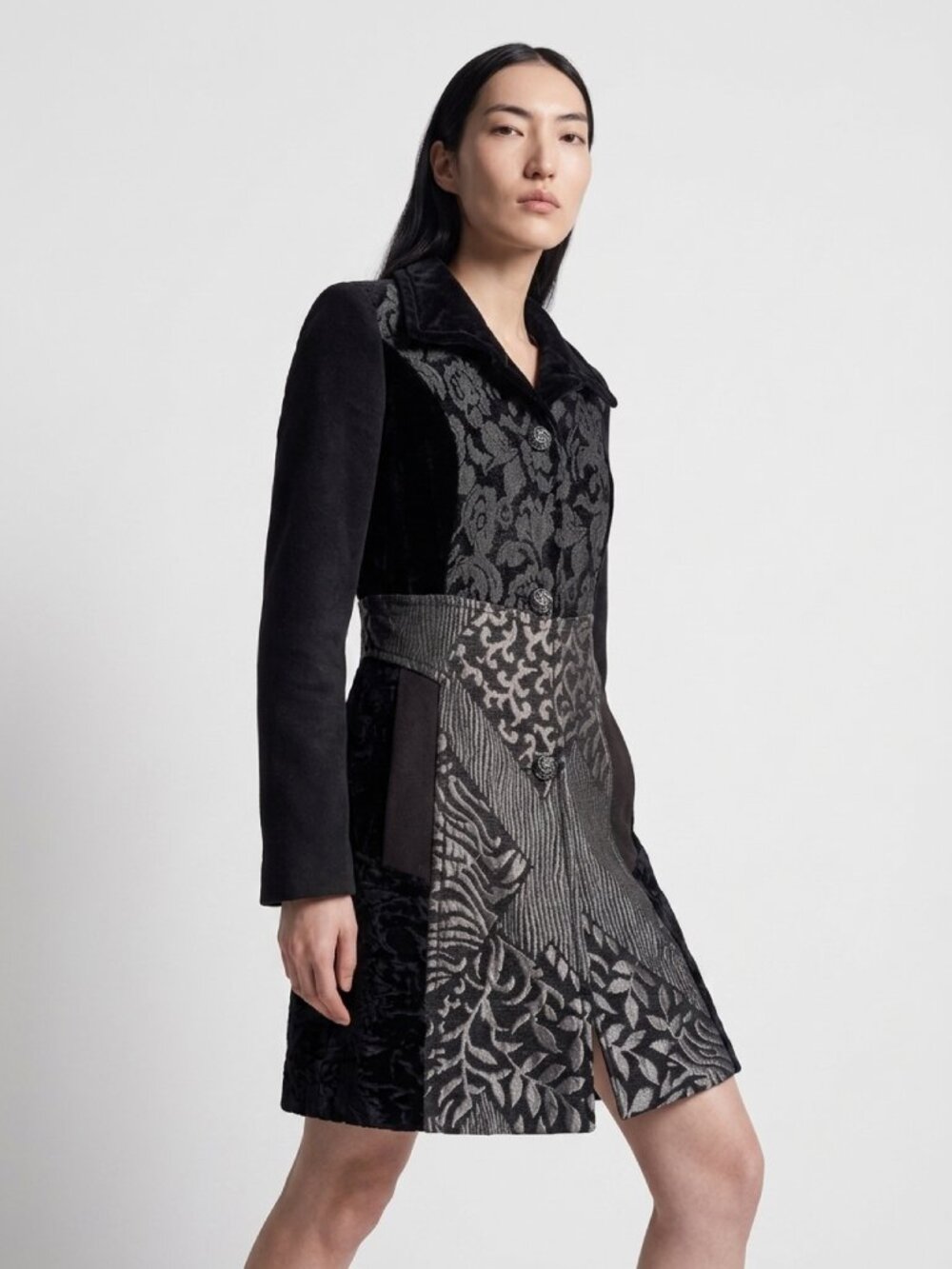 Elegant patchwork Laura coat features a mix of black floral velvet and bronze